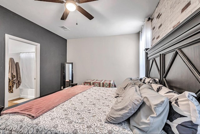 bedroom with connected bathroom and ceiling fan