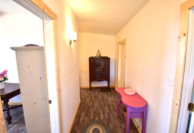 hallway with dark wood-type flooring