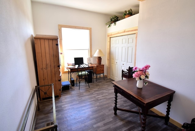 office space with dark hardwood / wood-style flooring