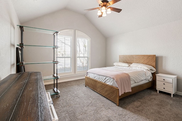 bedroom featuring baseboards, a ceiling fan, carpet flooring, and vaulted ceiling