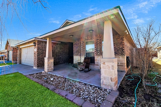 exterior space with a porch and a garage