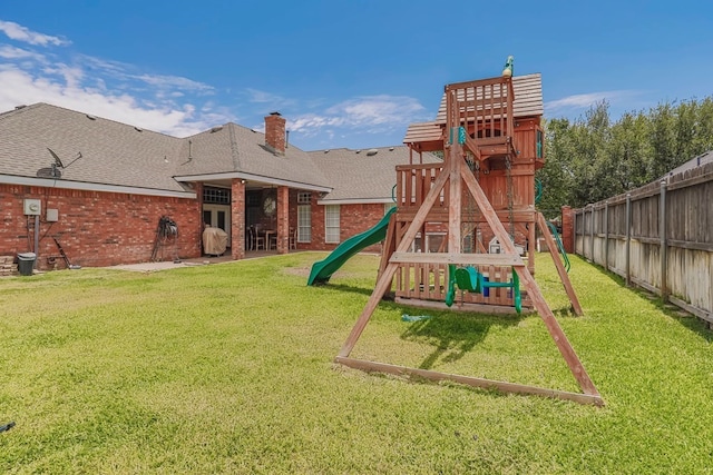 view of play area with a yard