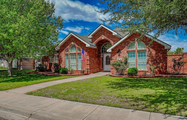 view of front of property with a front lawn