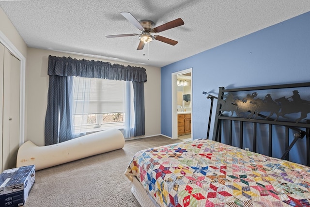 carpeted bedroom featuring a textured ceiling, a closet, and ceiling fan