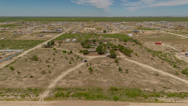 birds eye view of property featuring a rural view