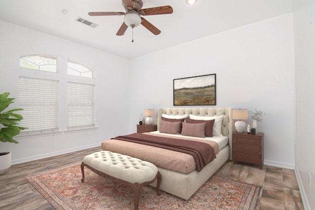 bedroom featuring ceiling fan and wood-type flooring