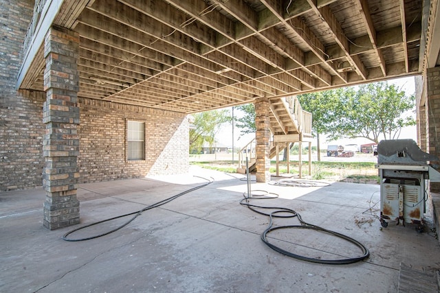 view of patio featuring a grill