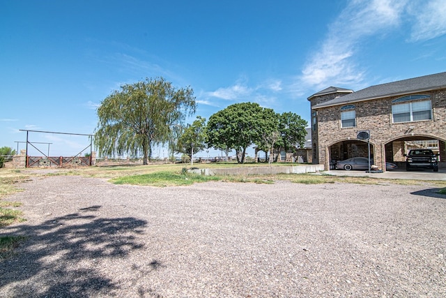 view of yard featuring a carport