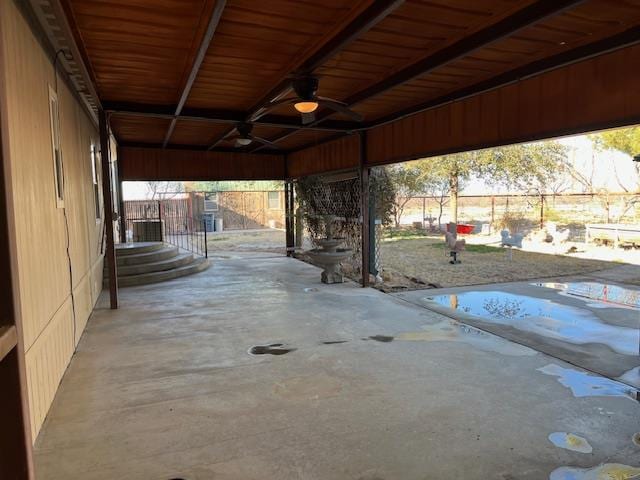 garage featuring central AC unit and ceiling fan