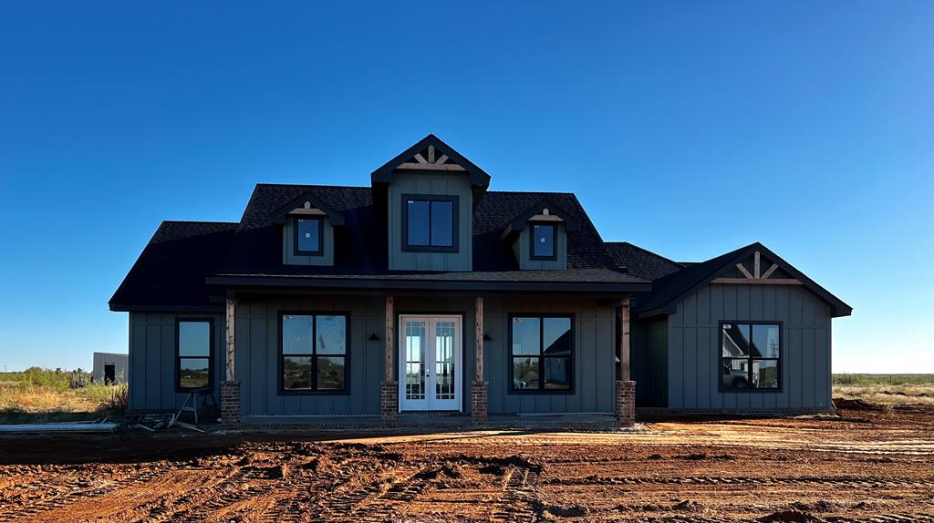 view of front facade featuring french doors