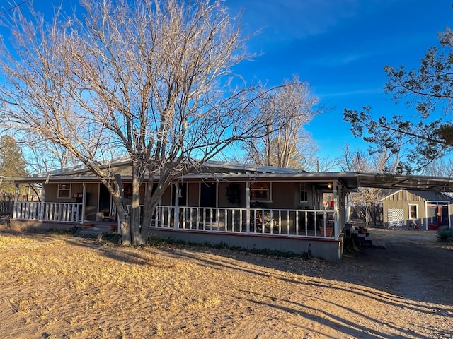 ranch-style house with a porch