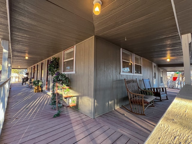 wooden terrace with covered porch