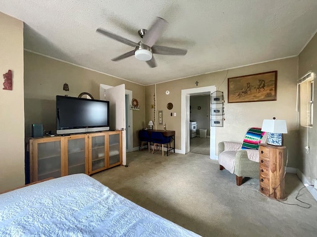 bedroom featuring a textured ceiling, carpet floors, and ceiling fan