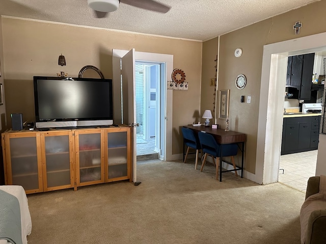 living room with light carpet, a textured ceiling, and ceiling fan