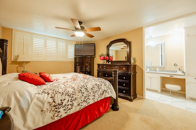 bedroom with ceiling fan and light carpet