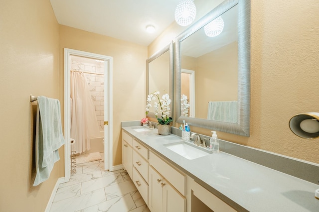 bathroom featuring shower / tub combo with curtain and vanity