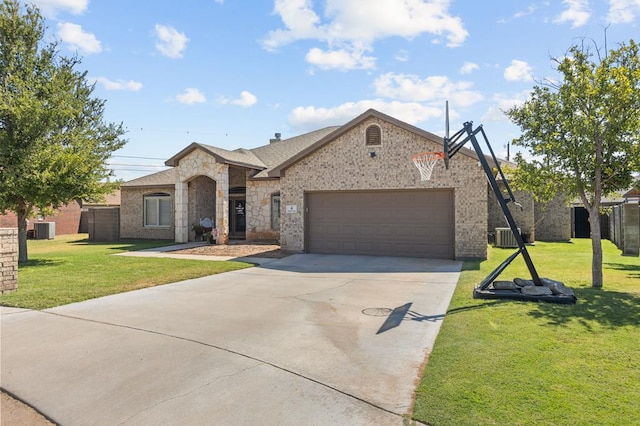 view of front of house with a front lawn and a garage