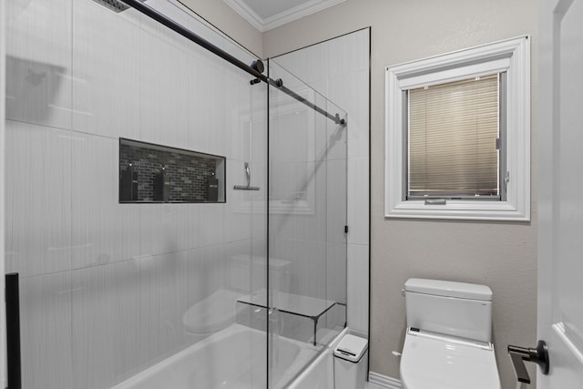 bathroom featuring toilet, shower / bath combination with glass door, and crown molding