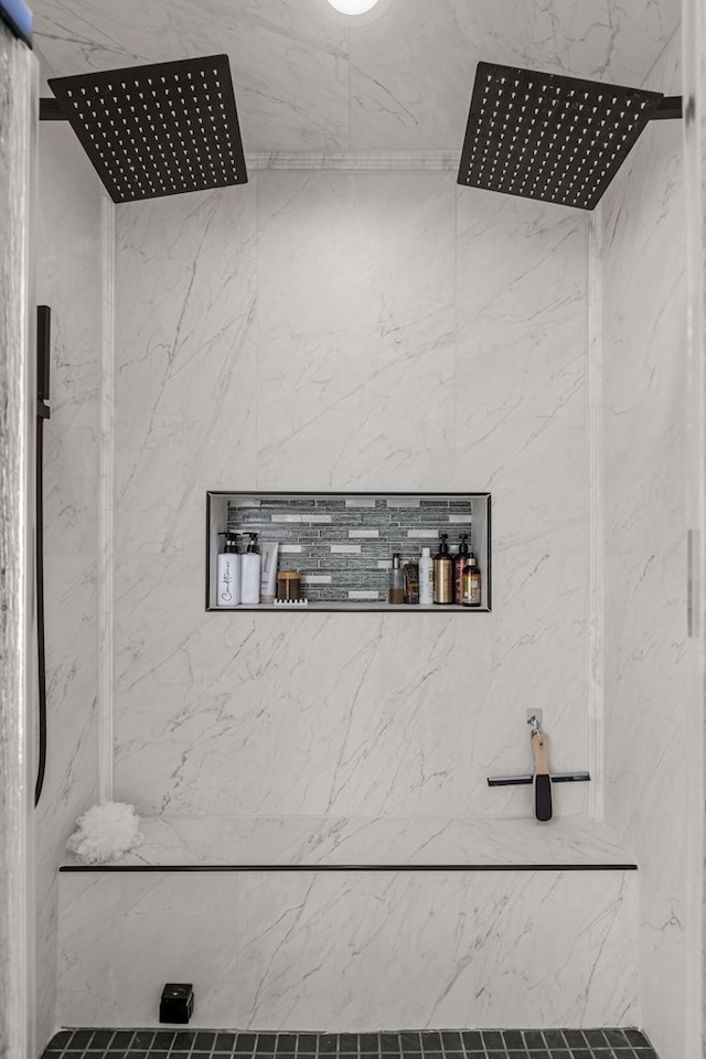 details featuring a tile shower