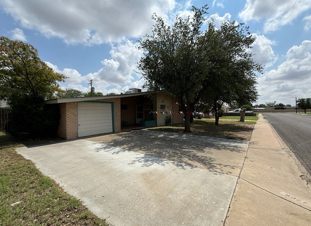 single story home with a garage