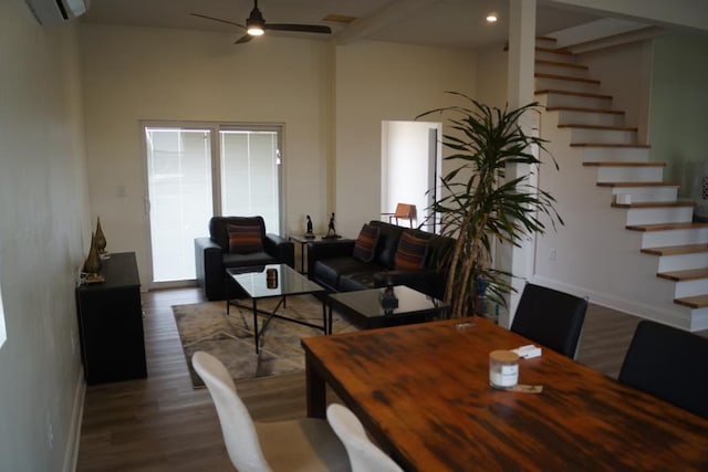 dining space with dark wood-type flooring, ceiling fan, and a wall unit AC