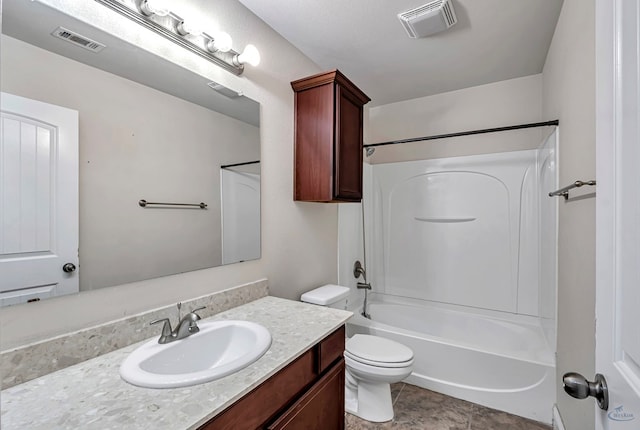 full bathroom with washtub / shower combination, vanity, and toilet