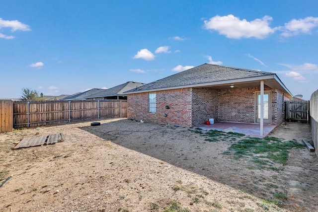 rear view of property with a patio area