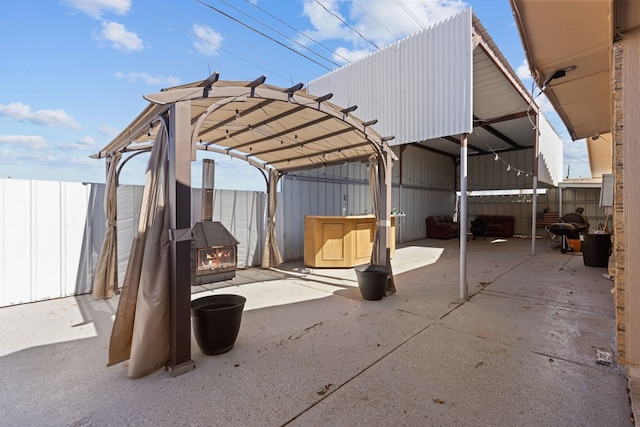 view of patio with fence and a pergola