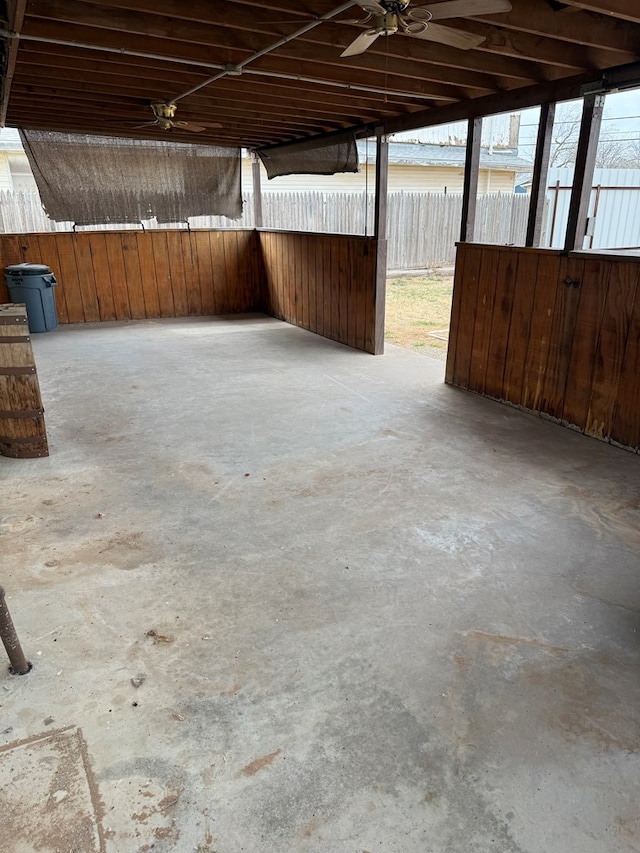 view of patio with an attached carport and a ceiling fan