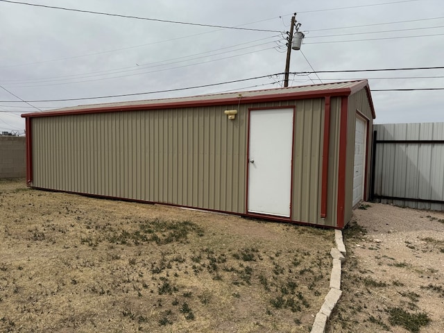 view of outdoor structure with an outdoor structure and fence