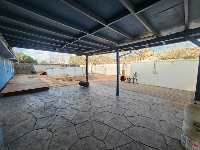 view of patio / terrace featuring a fenced backyard and a deck