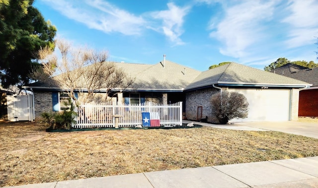 single story home with an attached garage, driveway, fence, and brick siding