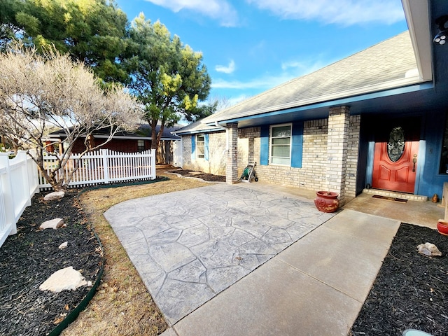 view of patio with fence