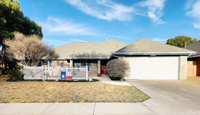 ranch-style house with a garage, fence, concrete driveway, and brick siding