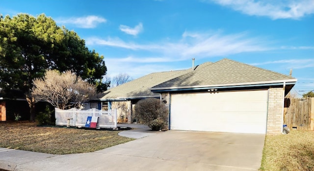 single story home with a garage, brick siding, fence, concrete driveway, and roof with shingles