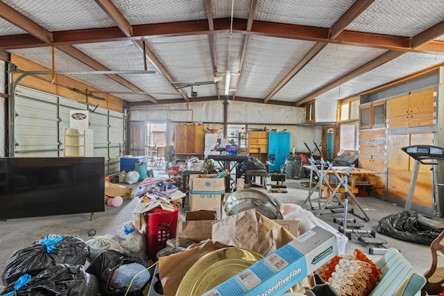 misc room with a wealth of natural light and concrete floors