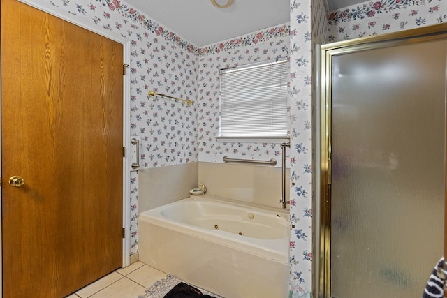 bathroom with tile patterned floors and independent shower and bath