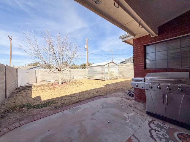 view of patio / terrace featuring a storage unit