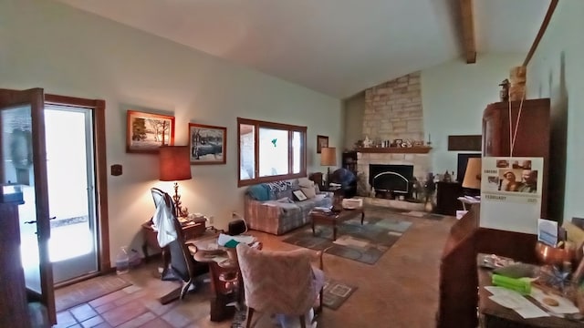 living area featuring a fireplace, high vaulted ceiling, and beamed ceiling