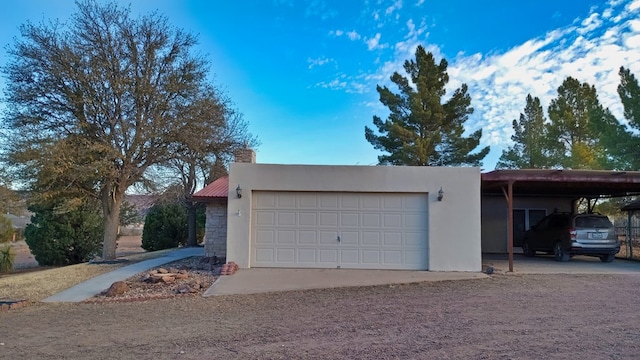 garage with a carport