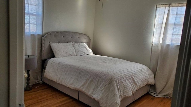 bedroom featuring hardwood / wood-style floors