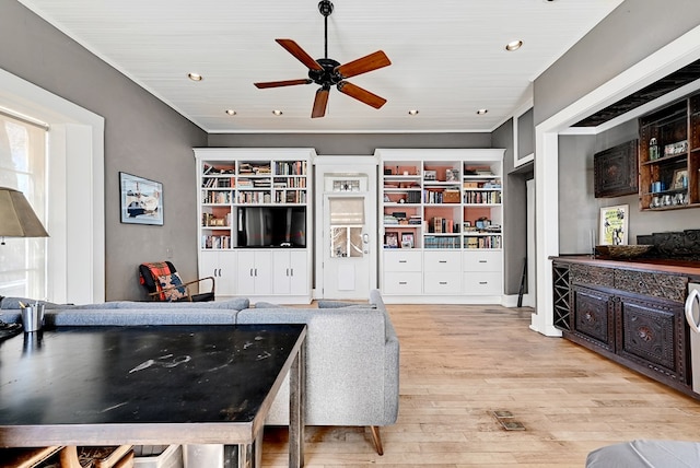 kitchen with ceiling fan and light hardwood / wood-style floors