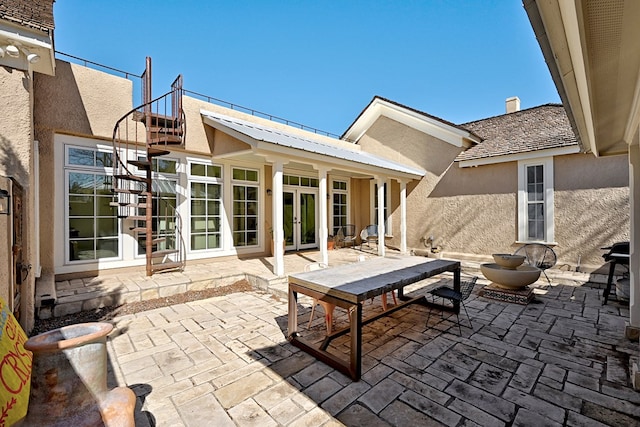 view of patio featuring french doors