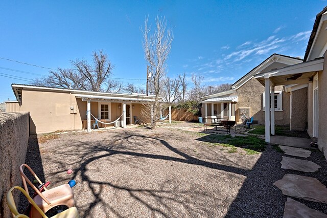 back of property featuring a patio area