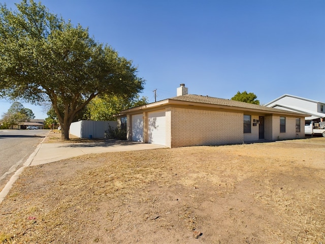 view of property exterior with a garage