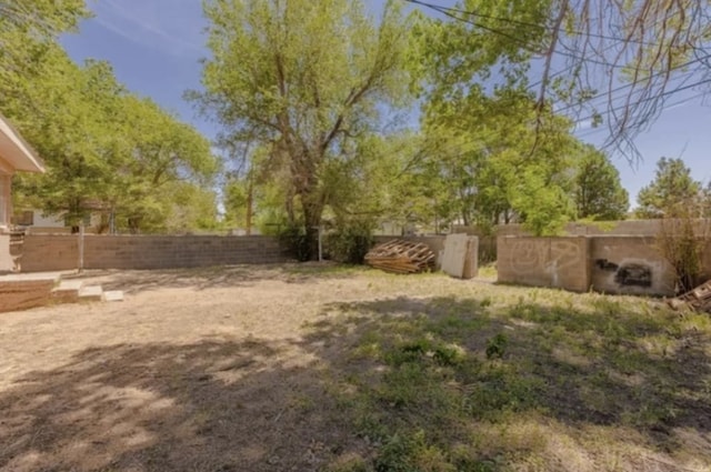 view of yard with fence