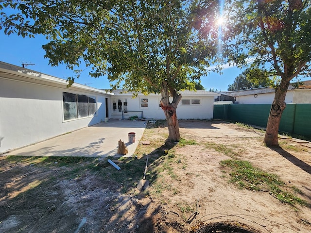 rear view of property with a patio area