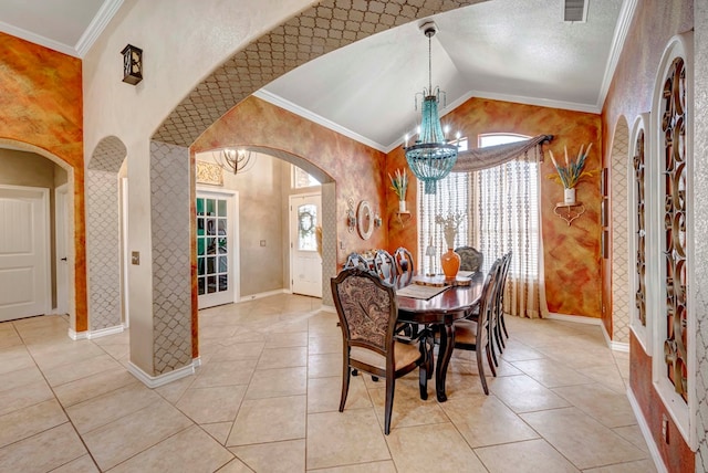 dining room with arched walkways, vaulted ceiling, an inviting chandelier, and ornamental molding