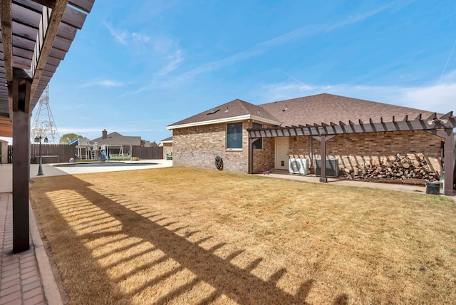 view of yard featuring a patio, a fenced in pool, a fenced backyard, a pergola, and central air condition unit