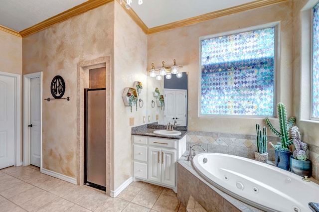 bathroom with vanity, a whirlpool tub, crown molding, and tile patterned flooring